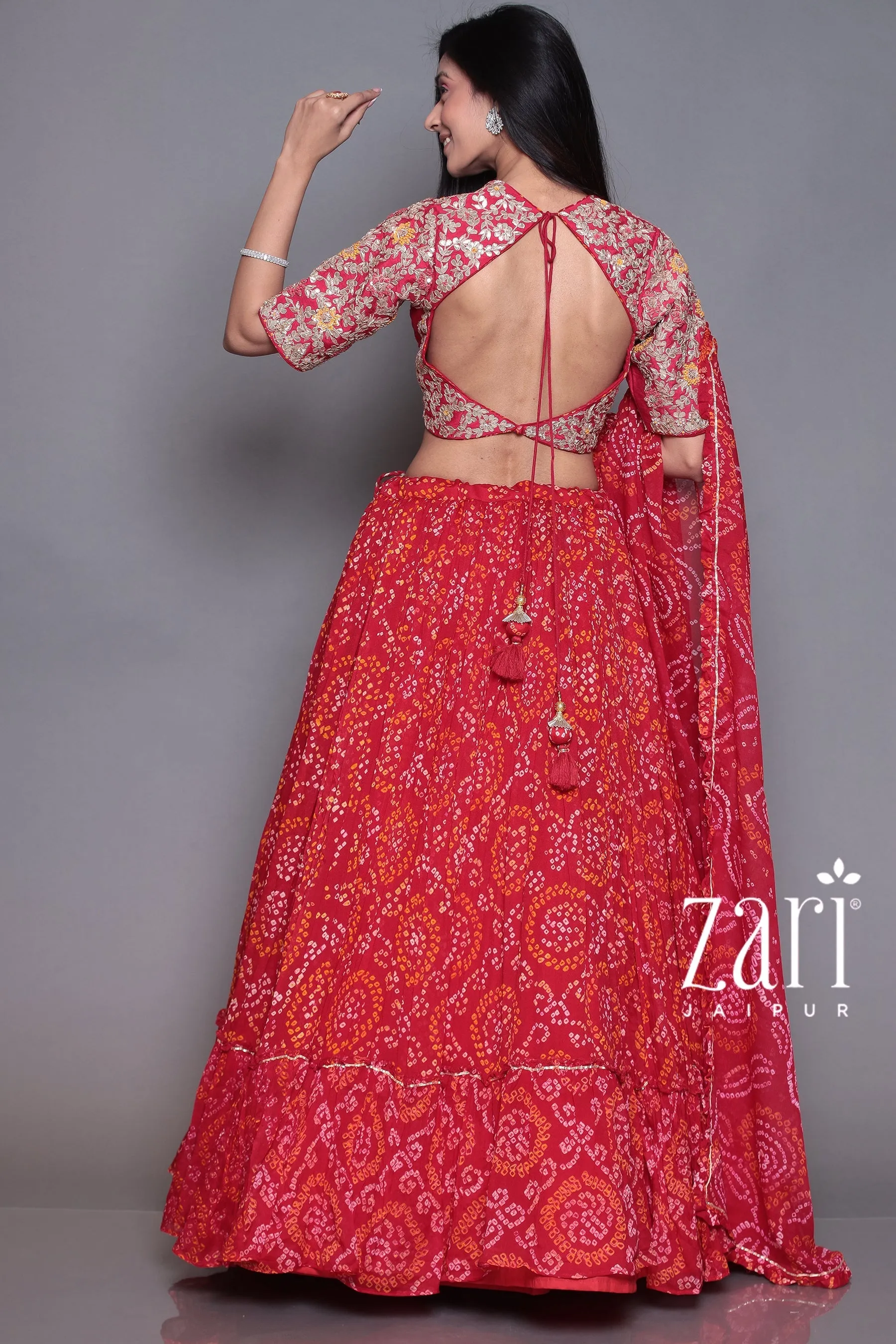 Bandhej Chinon silk  Lehenga with Aari, Gota Patti, Sequins, Thread, Zardozi work.